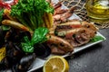 seafood set. A plate full of cooked shrimp, fish, crayfish, mussels. banner, menu, recipe place for text, top view Royalty Free Stock Photo