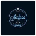 Seafood shop logo. Round linear logo of fish store