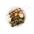 Seafood skewer with salad, sauce top view, healthy grilled food ingredient close up, clipping path, Mediterranean diet Royalty Free Stock Photo