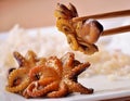 Seafood. Small marinated octopuses. Royalty Free Stock Photo