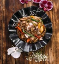 Seafood soba noodles wok in a black plate Royalty Free Stock Photo