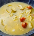 Seafood soup plate with clams and prawns