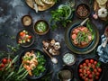 Seafood soup with salmon, prawns, tomatoes, herbs, garlic and spices on a dark background.