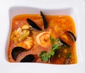 Seafood soup in white bowl top view Royalty Free Stock Photo