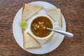 Seafood soup in a white bowl on wooden table, Tanzania, east Africa, close up Royalty Free Stock Photo