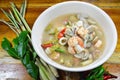 Seafood spicy hot soup and mixed herb Royalty Free Stock Photo