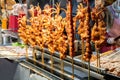 Seafood squid street food at Xian Muslim quarter in China. Delicious grilled spicy squid street food at Muslim Quarter, street,