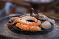 Seafood on steaming and grilling cooker pot Royalty Free Stock Photo