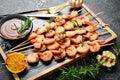 Seafood. Tiger prawns. Shrimp fried in skewers. Royalty Free Stock Photo