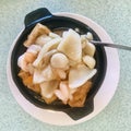 Seafood tofu stew in casserole. Top view.