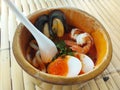 Seafood Tom Yum Noodles in bamboo Bangkok, Thailand. Royalty Free Stock Photo