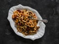 Seafood tomato sauce spaghetti - delicious lunch dinner on a dark background, top view Royalty Free Stock Photo