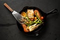 Seafood with veggies in a cast iron pot Royalty Free Stock Photo