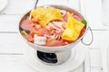 Seafood with yentafo soup serving in hot pot Royalty Free Stock Photo