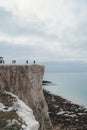 Seaford, East Sussex. People walking the paths on the top of the Chalk Cliffs. Seven Sisters, South of England