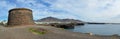 Seafront Panorama of Playa Blanca Lanzarote with Napolionic Fort. Royalty Free Stock Photo