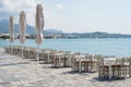 Seafront restaurant chair tables sea ocean view shore island, Greece