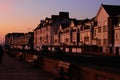 Seafront street with houses at sunset in Seaford, United Kingdom Royalty Free Stock Photo