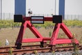 Seagull on the end of track block at traintrack in the harbor of Rotterdam Royalty Free Stock Photo