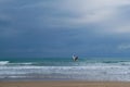 Seagull flying against blue dramatic cloudy sky Royalty Free Stock Photo