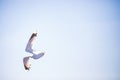 Seagull flying on blue clear sky background. Close-up shot Royalty Free Stock Photo