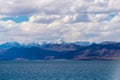 Beautiful scenery of Pangong Tso lake with  blue sky  white clouds in China side Royalty Free Stock Photo