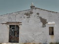 A seagull perched on the roof of an old house Royalty Free Stock Photo