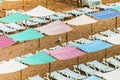 Seagull in the sand at the beach, colorful umbrellas, canopies