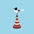 A seagull sits on a buoy in the sea.