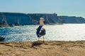 Seagull standing and watching the beautiful view of limestone cliff rocks
