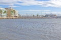 Seagulls in bay and BQ Aquamarina oceanfront hotel in strong winds