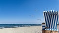 Seagulls, beach and a beach chair