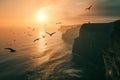 Seagulls flying above rough sea cliffs in scenic Irish landscape. Wild birds of west coast of Ireland, dramatic sunset