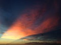 Seagulls Flying in Sky with Crepuscular Rays above Atlantic Ocean Beach during Dawn. Royalty Free Stock Photo