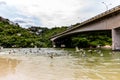 seagulls flying underneath bridge in the point where the sea meets the Marapendi Lagoon, in Barra da Tijuca, Rio de Janeiro Royalty Free Stock Photo