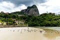 seagulls flying underneath bridge in the point where the sea meets the Marapendi Lagoon, in Barra da Tijuca, Rio de Janeiro Royalty Free Stock Photo