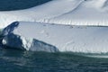 Seagulls resting on an iceberg