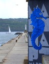 Seahorse graffiti on breakwater Royalty Free Stock Photo