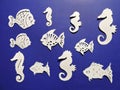 Seahorses and fish pattern. Paper cutting. Royalty Free Stock Photo