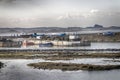 Seahouses Harbour in Northumberland with Bamburgh Castle Royalty Free Stock Photo