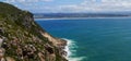 Seal colony bathing in the sun and waters of Robberg `Seal Mountain` Peninsula Royalty Free Stock Photo