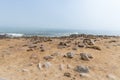 The seal colony at Cape Cross, on the atlantic coastline of Namibia, Africa. Expansive view on the beach, the rough ocean and the Royalty Free Stock Photo