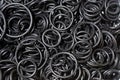 Seal O-ring black rubber. Sealing NBR gaskets for hydraulic system. Chemical resistant Spare part. Industrial background Royalty Free Stock Photo