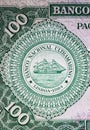 Seal of portuguese Banco National Ultramarino on Mozambique 100 Escudos currency banknote from 60s