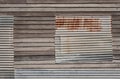 Sealed up windoe on abandoned timber home