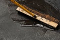 Sealing a damaged asphalt drive way Royalty Free Stock Photo