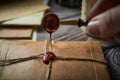 Sealing wax on ancient papers, antique stamp, and old documents