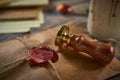 Sealing wax on ancient papers, antique stamp, and old documents