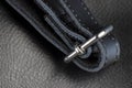 the seam at the junction of two pieces of black leather Royalty Free Stock Photo