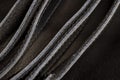 the seam at the junction of two pieces of black leather Royalty Free Stock Photo